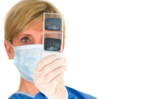 Though she's holding the xrays backwards and upside down I will allow it since it's a free photo from here. 